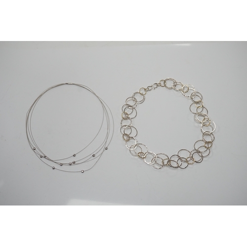 901 - A modern Pruden & Smith silver and yellow metal hoop necklace and a 750 white metal and diamond set ... 