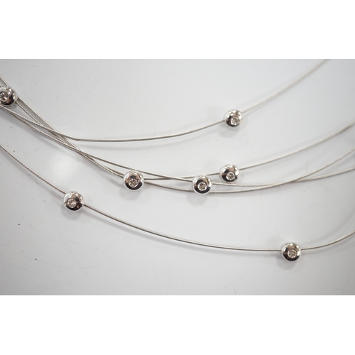 901 - A modern Pruden & Smith silver and yellow metal hoop necklace and a 750 white metal and diamond set ... 