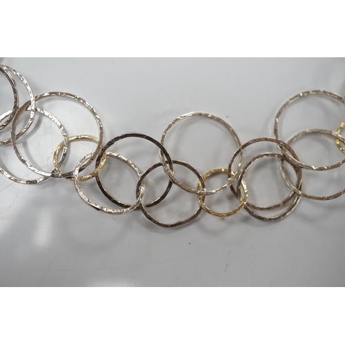 901 - A modern Pruden & Smith silver and yellow metal hoop necklace and a 750 white metal and diamond set ... 