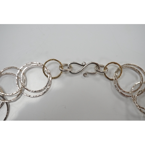 901 - A modern Pruden & Smith silver and yellow metal hoop necklace and a 750 white metal and diamond set ... 