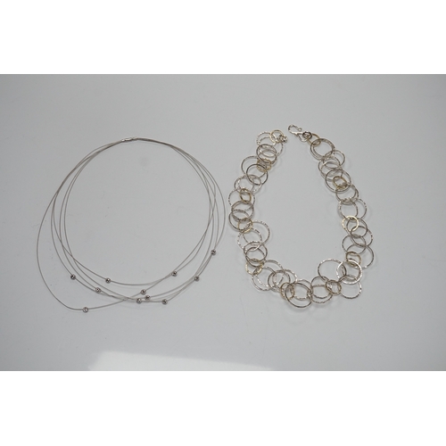 901 - A modern Pruden & Smith silver and yellow metal hoop necklace and a 750 white metal and diamond set ... 