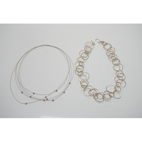 901 - A modern Pruden & Smith silver and yellow metal hoop necklace and a 750 white metal and diamond set ... 