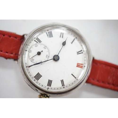 902 - A George V 9ct gold manual wind wrist watch, with Roman dial, case diameter 27mm and a similar silve... 