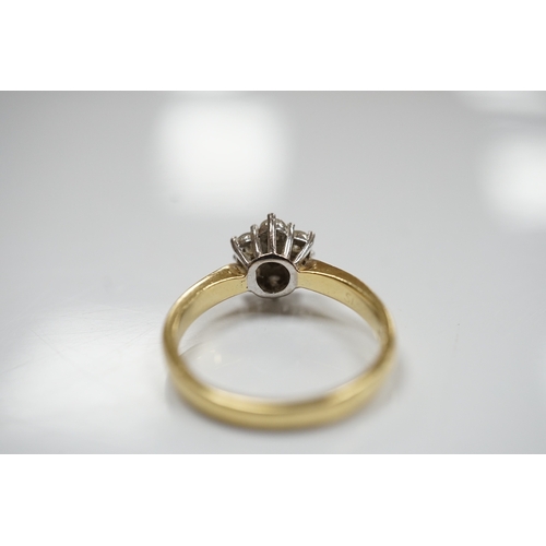 908 - A modern 18ct gold and seven stone diamond cluster set ring, with a total diamond weight of 0.50ct, ... 