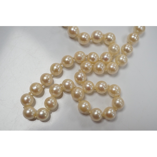 909 - Two modern single strand cultured pearl necklaces, one with cultured pearl and gem set 18ct gold cla... 