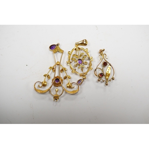 917 - Three assorted early 20th century 9ct and gem set pendants, largest 53mm, gross weight 6.4 grams. Co... 