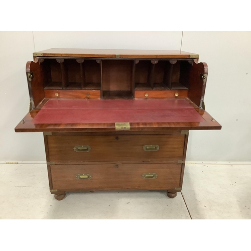 92 - A Victorian brass mounted mahogany two part secretaire military chest with later pigeonhole interior... 