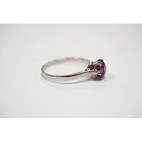 930 - A white metal (stamped plat) and solitaire ruby set ring, size L, gross weight 2.2 grams. Condition ... 