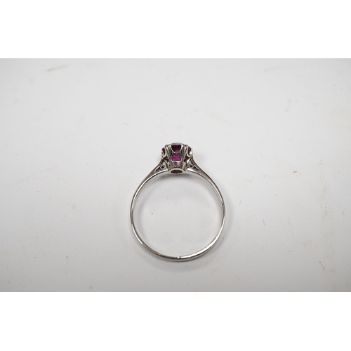 930 - A white metal (stamped plat) and solitaire ruby set ring, size L, gross weight 2.2 grams. Condition ... 