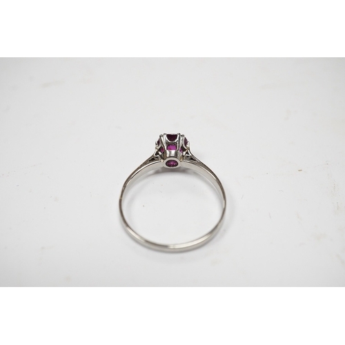 930 - A white metal (stamped plat) and solitaire ruby set ring, size L, gross weight 2.2 grams. Condition ... 