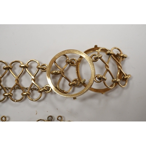 932 - A 9ct gold coin bracelet (now lacking coins), one other 9ct gold coin mount and a similar yellow met... 