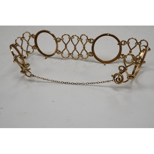 932 - A 9ct gold coin bracelet (now lacking coins), one other 9ct gold coin mount and a similar yellow met... 