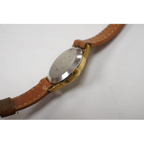 938 - A lady's steel and gold plated Omega manual wind wrist watch, on an associated leather strap, togeth... 