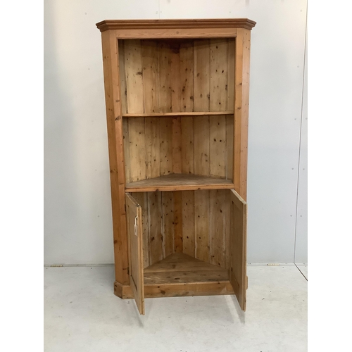 97 - A 19th century pine standing corner cupboard, width 106cm, depth 52cm, height 199cm. Condition - fai... 