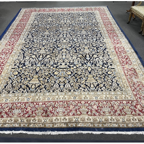 98 - A North West Persian blue ground carpet, 394 x 284cm. Condition - good