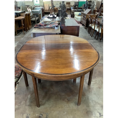 1022 - A George III banded mahogany D end extending dining table, 178cm extended, one spare leaf, depth 137... 