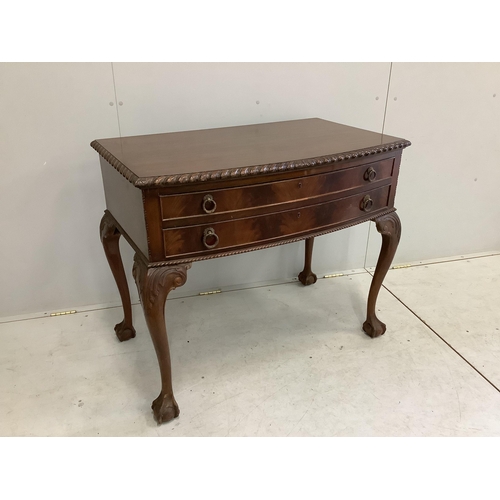 1026 - A Chippendale Revival mahogany dining suite comprising extending dining table, 210cm extended, two s... 