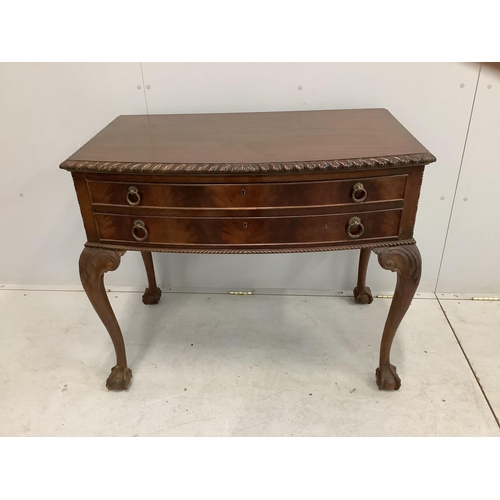 1026 - A Chippendale Revival mahogany dining suite comprising extending dining table, 210cm extended, two s... 