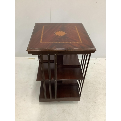 1029 - An Edwardian style inlaid mahogany revolving bookcase, width 48cm, depth 48cm, height 79cm. Conditio... 