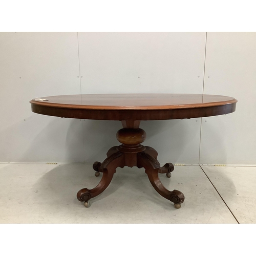 1030 - A Victorian oval mahogany tilt top loo table, diameter 146cm, depth 114cm, height 75cm. Condition - ... 