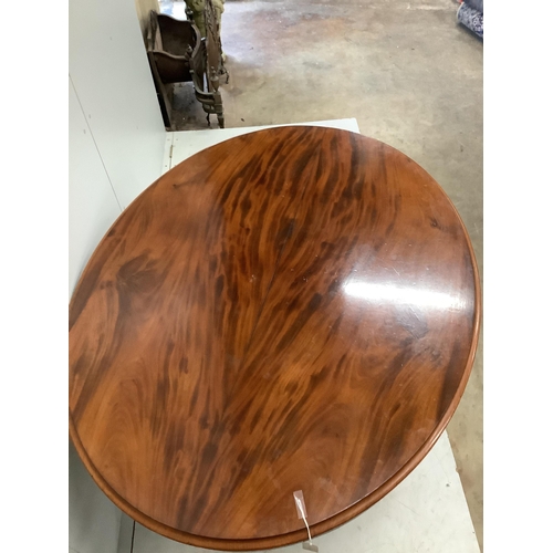 1030 - A Victorian oval mahogany tilt top loo table, diameter 146cm, depth 114cm, height 75cm. Condition - ... 