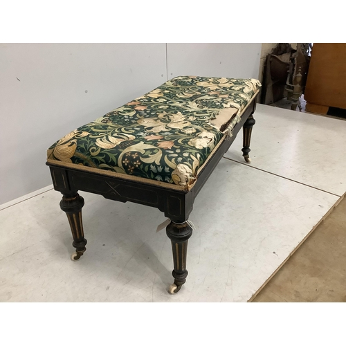 1033 - A late Victorian ebonised stool with hinged box seat, width 113cm, depth 49cm, height 50cm. Conditio... 