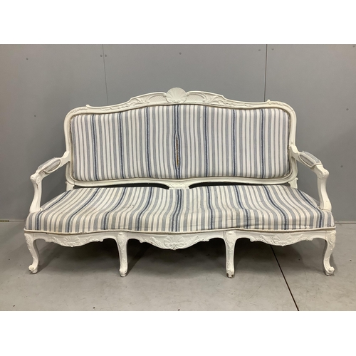 1043 - A Louis XVI style painted upholstered settee, width 180cm, depth 66cm, height 98cm. Condition - fair... 