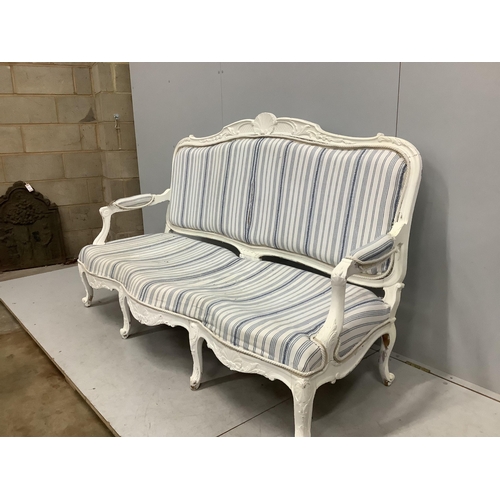 1043 - A Louis XVI style painted upholstered settee, width 180cm, depth 66cm, height 98cm. Condition - fair... 