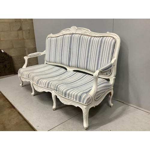 1043 - A Louis XVI style painted upholstered settee, width 180cm, depth 66cm, height 98cm. Condition - fair... 