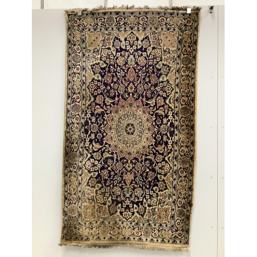 1051 - Three North West Persian style rugs and one other rug, largest 200 x 110cm. Condition - poor to fair... 