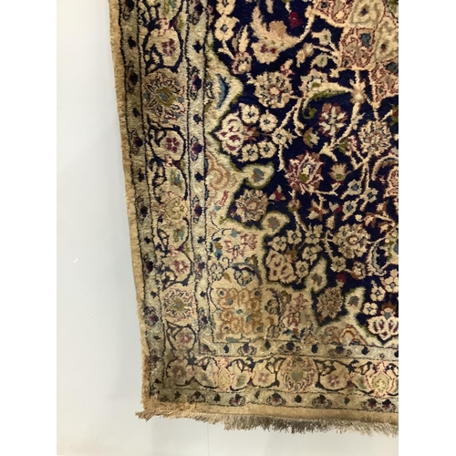 1051 - Three North West Persian style rugs and one other rug, largest 200 x 110cm. Condition - poor to fair... 