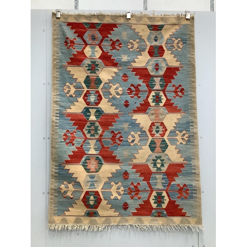 1054 - Two Kilim rugs, mat and two fragments, largest 170 x 120cm. Condition - fair