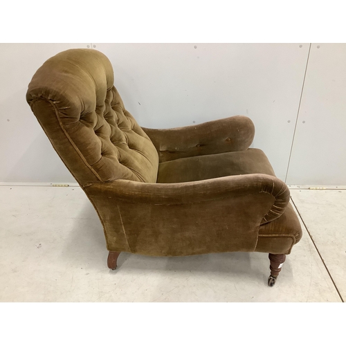 1056 - A Victorian Howard style armchair, width 76cm, depth 86cm, height 92cm. Condition - fair