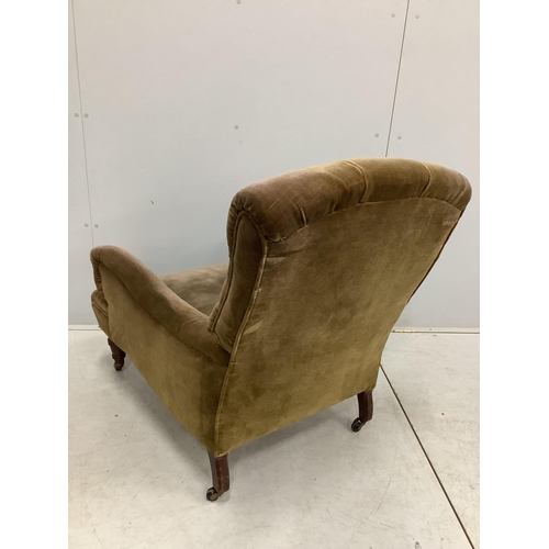 1056 - A Victorian Howard style armchair, width 76cm, depth 86cm, height 92cm. Condition - fair