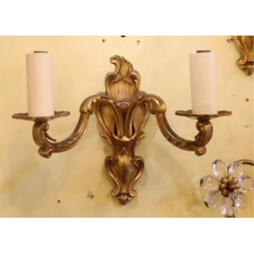 1064 - A pair of late 19th century French ormolu twin branch wall lights, 21cm high. Condition - fair to go... 