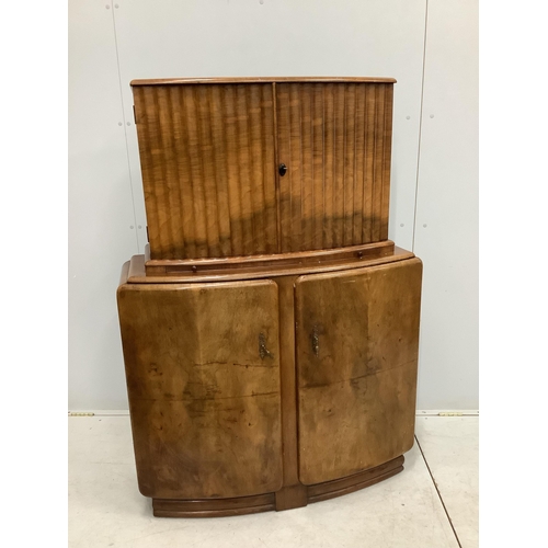 1071 - An Art Deco style walnut cocktail cabinet, width 102cm, depth 38cm, height 144cm. Condition - fair... 