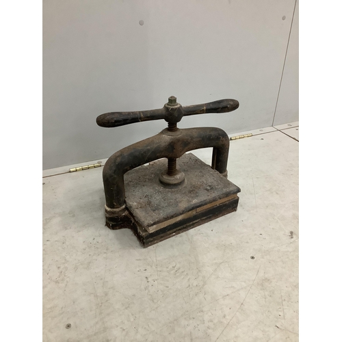 1081 - A Victorian cast iron book press, width 40cm, height 30cm. Condition - poor