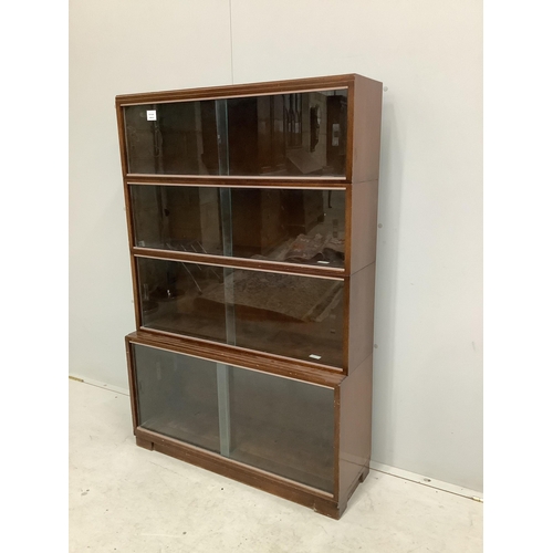 1082 - A Minty style mahogany four section bookcase, width 89cm, depth 29cm, height 135cm. Condition - fair... 