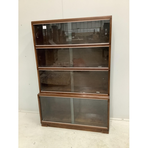 1082 - A Minty style mahogany four section bookcase, width 89cm, depth 29cm, height 135cm. Condition - fair... 