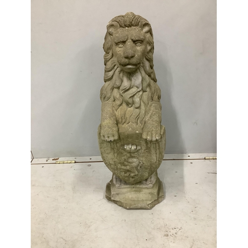 1087 - A reconstituted stone heraldic lion garden ornament, height 72cm. Condition - poor to fair, plinth b... 