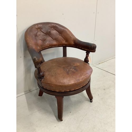 1094 - A 19th century Holland & Son leather button back office chair (missing one castor), width 65cm, dept... 