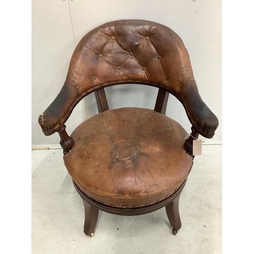 1094 - A 19th century Holland & Son leather button back office chair (missing one castor), width 65cm, dept... 