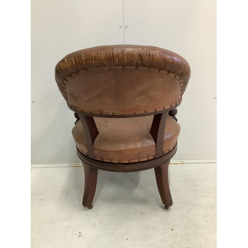 1094 - A 19th century Holland & Son leather button back office chair (missing one castor), width 65cm, dept... 