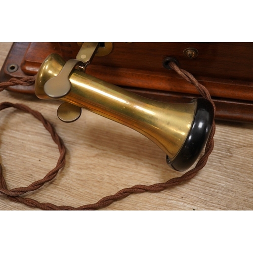 1251 - A 1920s mahogany wall mounted GPO Model 121 telephone, Patent no.178938. Condition - good.