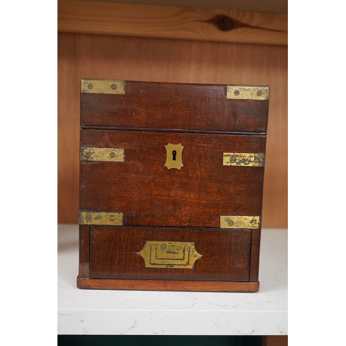 1254 - An early 19th century mahogany apothecary box, containing ten glass bottles, one with original paper... 