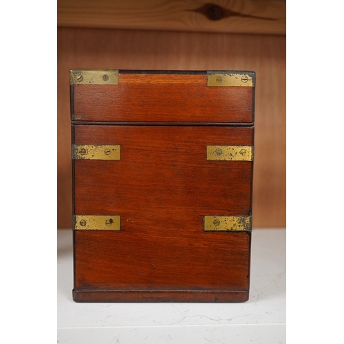 1254 - An early 19th century mahogany apothecary box, containing ten glass bottles, one with original paper... 