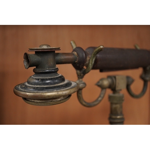 1255 - An early 20th century mahogany cased telephone, possibly by Ericsson, with handset on decorative cra... 