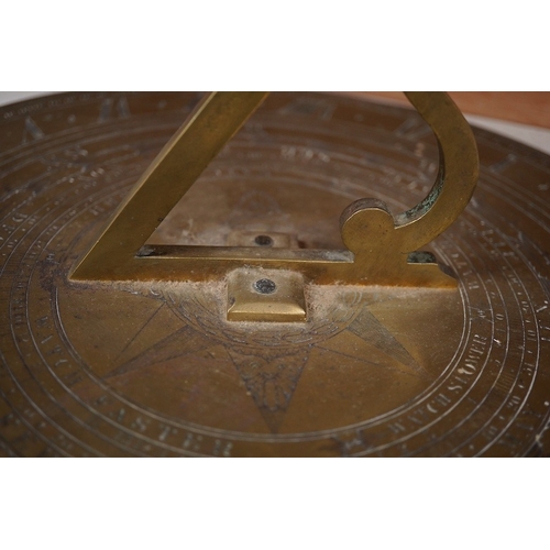 1261 - An early Victorian Adie & Son bronze sun dial, engraved; Edinburgh 1842, 32cm diameter, 19cm to end ... 