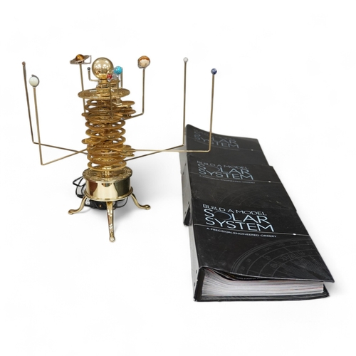 1262 - A precision brass orrery, a kit built electric operated astronomical orrery issued by Eaglemoss Publ... 