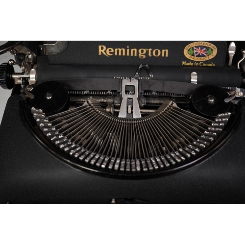 1267 - A cased Remington Model 5 portable typewriter. Condition - good.